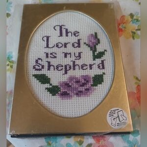 Cross-Stitch Art with Floral Design